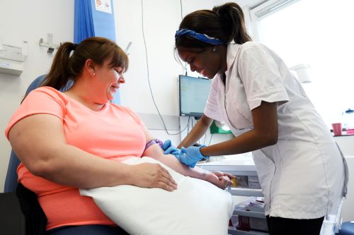 Photograph of a patient having a blood test