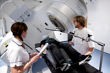 Photo of a child wearing a radiotherapy mask having brain radiotherapy