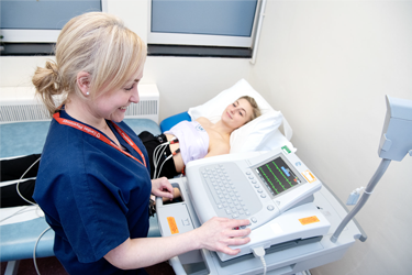 Photo showing a nurse doing an ECG